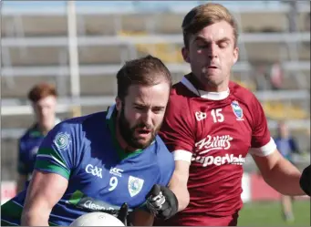  ??  ?? Brendan Doyle of Glynn-Barntown is challenged by Ryan Murphy (St. Martin’s).