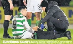  ??  ?? SUFFERING SAINTS
Mikey is hurt against St Johnstone