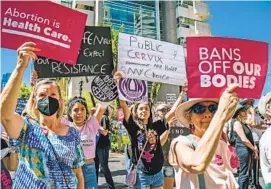  ?? ARIANA DREHSLER FOR THE U-T ?? Protesters march at a pro-choice rally Downtown on May 14 after the leak of a Supreme Court draft decision that indicated Roe v. Wade would be overturned.