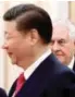  ??  ?? Xi (left) meets Tillerson in Beijing yesterday.