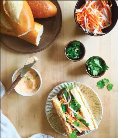  ?? PHOTO BY CAROLYN JENSEN ?? Bon Appétit’s banh mi sandwiches pack a flavorful punch.