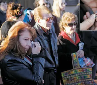  ?? PHOTOS BY LUIS SÁNCHEZ SATURNO/ THE NEW MEXICAN ?? LEFT: Debra Salazar wipes her tears during Wednesday’s memorial service while Paige Kitson, director of Youth Shelters & Family Services’ Street Outreach Program, and Interfaith Community Shelter volunteer Joe Dudziak read off the names of homeless...