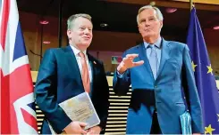  ??  ?? First round: David Frost, left, and Michel Barnier in Brussels