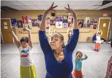  ?? ROBERTO E. ROSALES/JOURNAL ?? Eva Encinias conducts a flamenco class for kids at the Tierra Adentro Charter School in 2014. She has retired from teaching at the University of New Mexico but will stay involved with the charter school.