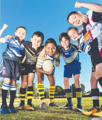  ?? Picture: ZAK SIMMONDS ?? BIG FANS: Townsville junior rugby league players Jordan Paulson, 7, Timana Mallard, 7, Moleke Prior, 11, Talan Koolman, 9, Kyan Wetherall, 9 and Cooper Snary, 8.