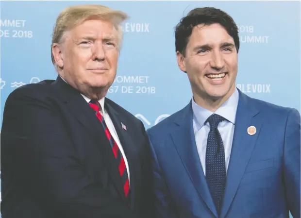  ?? SAUL LOEB / AFP / Get
y Images
Files ?? U. S. President Donald Trump and Prime Minister Justin Trudeau meet at the 2018 two- day G7 Summit held in Quebec.