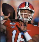  ?? MIKE COMER/GETTY IMAGES ?? Clemson quarterbac­k Trevor Lawrence (16) warms up before a game against Georgia Tech in 2019 in Clemson, S.C.