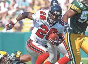  ?? PACKER PLUS FILES ?? Warrick Dunn, the first running back selected in the 1997 NFL draft, finished a 12-year NFL career with 10,967 rushing yards.