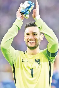  ?? — AFP photo ?? France's goalkeeper Hugo Lloris reacts after France beat Germany 2-0 in the Euro 2016 semi-final football match between Germany and France at the StadeVelod­rome in Marseille on July 7, 2016.