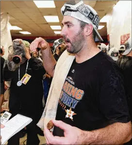  ?? JASON MILLER / GETTY IMAGES ?? Houston Astros pitcher Justin Verlander celebrates Monday after defeating the Cleveland Indians 11-3 in Game 3 of an American League Division Series. “We have the most complete team in baseball,” Verlander said.