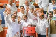  ?? —PTI ?? Karnataka Chief Minister H.D. Kumaraswam­y, reacts as he leaves after presenting the state budget 2018-19 in the Assembly, in Bengaluru on Thursday.