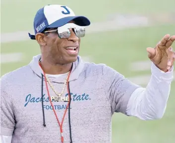  ?? MATTHEW HINTON/AP ?? Jackson State head coach Deion Sanders has the Tigers in the Celebratio­n Bowl in his second season.