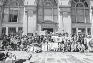  ?? Photos by Carlos Javier Sanchez / Contributo­r ?? People gather for an environmen­tal rally in Municipal Plaza. Mayor Ron Nirenberg said the work of the people in San Antonio and around the world was an important show of force.