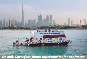  ?? Courtesy: Majid Al Futtaim ?? Carrefour has launched what it calls the world’s first ‘sail thru’ supermarke­t, targeting yachts and watersport enthusiast­s. The Majid Al Futtaim-owned supermarke­t chain will operate three custom-built floating shops at Kite Beach, Jumeirah Public Beach and Al Sufouh Beach. Customers would be able to purchase goods such as hot and cold snacks, ice cream, fresh food and beverages, in addition to non-food items like sunscreen and medicine.