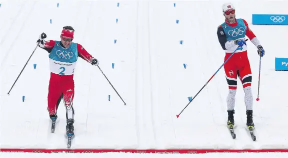  ?? JEAN LEVAC ?? Alex Harvey of Canada, left, edges out Martin Johnsrud Sundby of Norway to take fourth place in the men’s 50-kilometre cross-country skiing event on the eve of the closing ceremony to Pyeongchan­g 2018. With his strong finish, Harvey asserted to the...