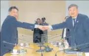  ??  ?? South Korea's vice minister of culture and sports Roh Taekang (right) shakes hands with his North Korean counterpar­t Won Kil U during a meeting in Kaesong, North Korea on Friday. North and South Korea agreed to officially inform the Internatio­nal Olympic Committee of their intent to cohost the 2032 Summer Olympics.AP