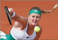  ?? REUTERS ?? Kristina Mladenovic serves to Garbine Muguruza during their French Open fourth-round match on Sunday.