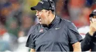  ??  ?? OSU head coach Ryan Day said even with a freshman quarterbac­k, the Buckeyes weren’t going to play it close to the vest: “That’s just not who we are.”