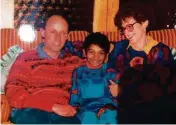  ??  ?? TOP: Saroo’s mother Fatima in their home in India, and her joy when she met him after 25 years. LEFT: with his adoptive parents. BELOW: with Sue and Fatima