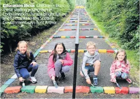  ??  ?? Education focus Children – likes these smiling youngsters in Lochwinnoc­h - have a bright future ahead thanks to the Scottish Government, says Tom Arthur