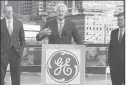  ?? MICHAEL DWYER/AP ?? Jeff Immelt, then the chief executive officer of General Electric Co., speaks at a groundbrea­king ceremony at the site of GE’s Boston headquarte­rs on May 8, 2017. Massachuse­tts Gov. Charlie Baker, left, and Mayor Marty Walsh look on.