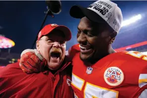  ?? (AP Photo/Brynn Anderson) ?? Kansas City Chiefs head coach Andy Reid celebrates with defensive end Frank Clark, right, after the NFL AFC Championsh­ip playoff football game Jan. 29 against the Cincinnati Bengals in Kansas City, Mo. The Chiefs won 23-20.