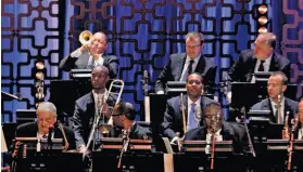  ?? Charles Eshelman / Getty Images ?? Wynton Marsalis (back left) and the Jazz at Lincoln Center Orchestra will play March 17 at Zellerbach Hall as part of Cal Performanc­es’ new season.