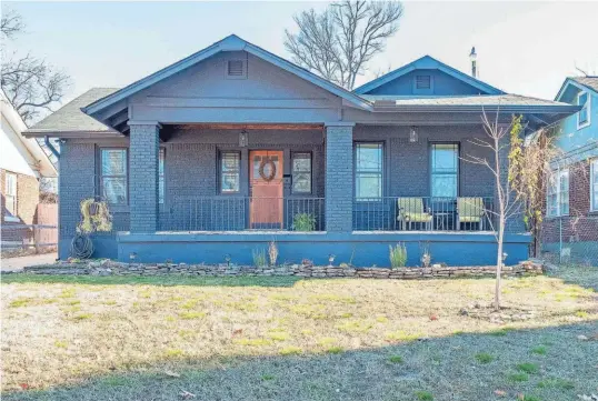  ?? ?? The brick bungalow, built in 1901, has approximat­ely 1,100 square feet of living space including 2 BR’S and 1 BA.