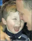  ??  ?? Ollie Jones, four, smiles with his dad Lloyd Jones