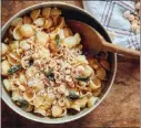  ?? PHOTO BY CHRISTOPHE ROUE ?? Orecchiett­e pasta is served with hazelnuts, whose somewhat bitter skin can be removed more easily after roasting.