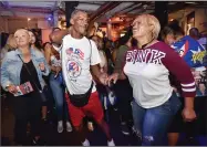  ?? Catherine Avalone / Hearst Connecticu­t Media ?? Willie DeJesus and Marian Nunez dance to the sounds of the Latin music of Orquesta Afinke at Puerto Ricans United, Inc. third annual Puerto Rican Festival of New Haven on Saturday at the Bregamos Community Theater at Blatchley Avenue.