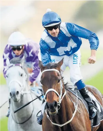  ?? Photo / Getty Images ?? Hugh Bowman rides Winx to victory in the race that bears her name, the Winx Stakes, at Randwick on Saturday.