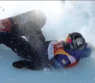  ?? GETTY IMAGES ?? Going, going, gone: Fuller lands after her jump but loses control immediatel­y and slides down the slope on her back