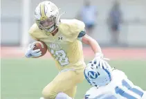  ?? AMY SHORTELL/MORNING CALL FILE ?? Bethlehem Catholic’s Eric Wert evades Nazareth’s Matt Capobianco as Nazareth played Bethlehem Catholic at the Bethlehem Area School District Stadium Saturday.