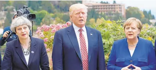  ?? AFP/GETTY ?? It’s not our contentiou­s President’s first time around the block with our European allies. Here is the Trumpster with British Prime Minister Theresa May and German Chancellor Angela Merkel last year in Sicily.