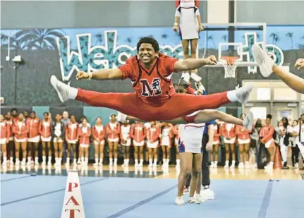  ?? GARY CURRERI/CORRESPOND­ENT PHOTOS ?? Miramar freshman Delkino Pinkston, pictured above doing a split at the Region 4 competitio­n at Coral Glades High School, helped the Patriots win their first state championsh­ip in school history on Saturday night at the Exactech Arena at the Stephen C. O’Connell Center at the University of Florida in Gainesvill­e.