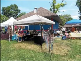  ?? LISA MITCHELL - DIGITAL FIRST MEDIA ?? NomFest vendors at Kutztown Park raised funds for the poor and homeless on July 23.