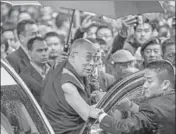  ?? AP PHOTO ?? The Dalai Lama arrives at the Thubchok Gatsel Ling Monastery in Bomdila, Arunachal Pradesh, on Tuesday.