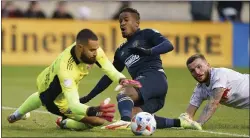  ?? CHRIS SZAGOLA - THE ASSOCIATED PRESS ?? The Union’s Sergio Santos, right, will need to finish more of these chances, like the one saved by Red Bulls goalie Carlos Coronel last week, if the Union want to advance past Nashville in Sunday’s Eastern Conference semifinal.