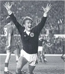  ??  ?? Kenny Dalglish after netting the second goal against Wales at Anfield in 1977.