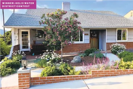  ?? BRIANNA MONTGOMERY PHOTOS ?? The Montgomery­s used low-water choices, like a f lowering desert willow tree, to get a SoCal version of an English cottage-style landscape.