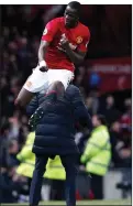  ??  ?? HIGH-FLYER: Eric Bailly celebrates United’s victory with Jose Mourinho