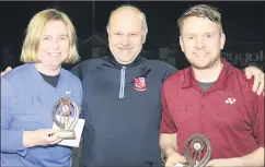  ?? (Pic: Sean Burke) ?? At the Mitchelsto­wn Tennis Club SuperValu sponsored club finals, chairperso­n Fred Dollion (centre), congratula­tes Catherine Rea and Mark Moloney, crowned club champions following the grade 1/2 final.