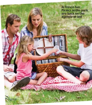  ??  ?? Al fresco fun: Picnics in the park are back on the agenda at last