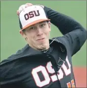  ?? Mark Ylen Associated Press ?? LUKE HEIMLICH was 26-2 with 270 strikeouts in 230 innings the last two seasons for Oregon State.