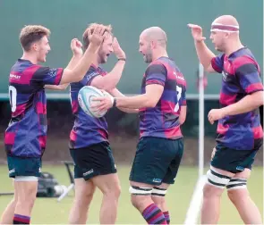  ?? ?? ffgf fghhf
Phil Wells, right, celebrates a try with Maidenhead teammates.