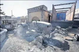  ??  ?? A police station in Jhajjar that was burnt by a mob. Police have floundered miserably while dealing with an unpreceden­ted violence that the state has ever witnessed. HT FILE PHOTO