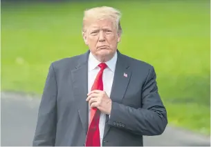  ?? EPA ?? President Donald Trump prepares to speak to the media as he departs the Oval Office of the White House for New York City in Washington, DC, on May 23.