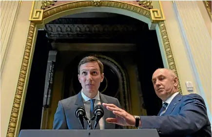  ?? PHOTO: AP ?? Chris Liddell, right, assists senior Trump adviser Jared Kushner at the opening session of Technology Week at the White House in June last year.