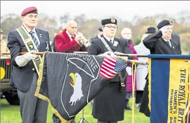  ?? ?? Standard bearers at the ceremony at the control tower